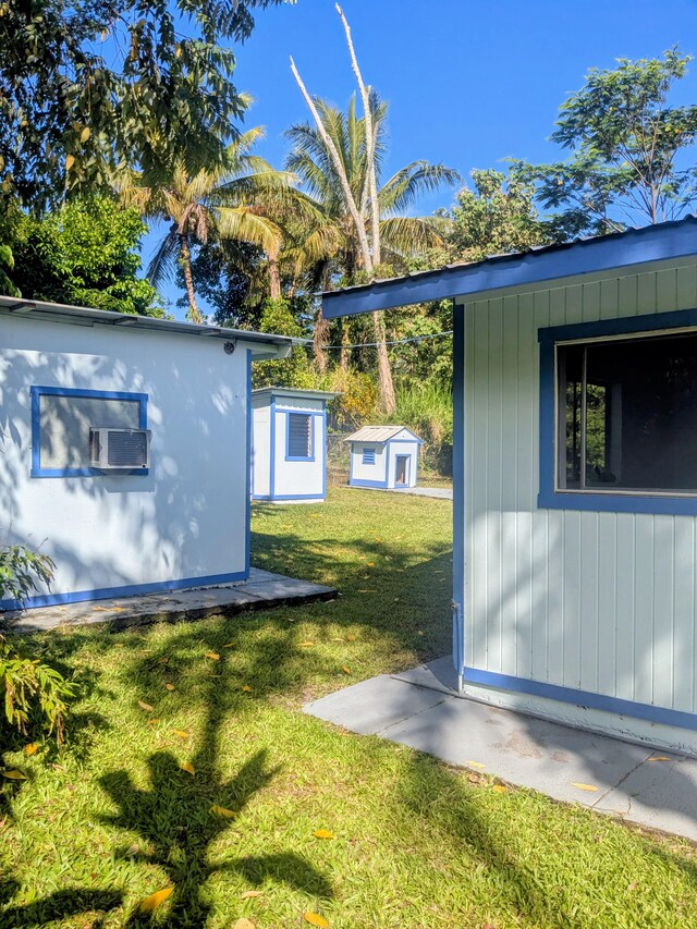 15-2714 Nenue St, Pahoa, HI 96778 - view of green lawn featuring an outdoor structure