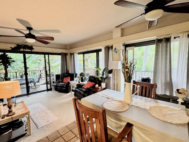 78-7100 Kamehameha Iii Rd Unit 306, Kailua-Kona, HI 96740 - dining space with a ceiling fan and a textured ceiling