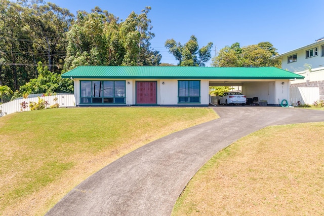45-550 Miulana Pl, Honokaa, HI 96727 - view of front of house with driveway, an attached carport, and metal roof