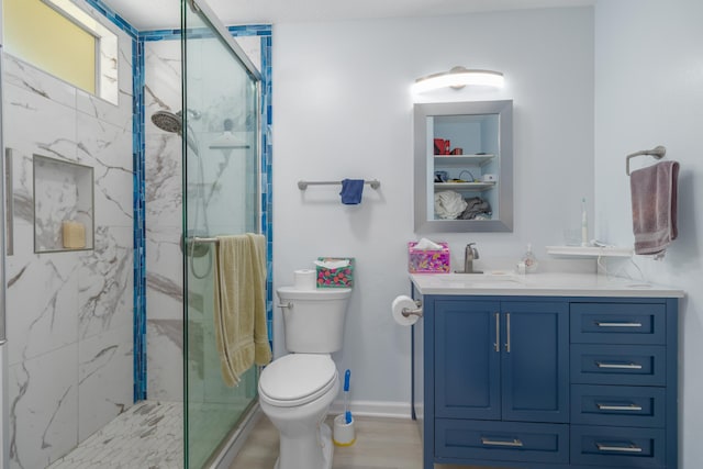 45-550 Miulana Pl, Honokaa, HI 96727 - full bathroom featuring toilet, a marble finish shower, vanity, and baseboards