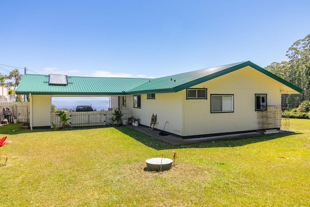 45-550 Miulana Pl, Honokaa, HI 96727 - rear view of property with metal roof
