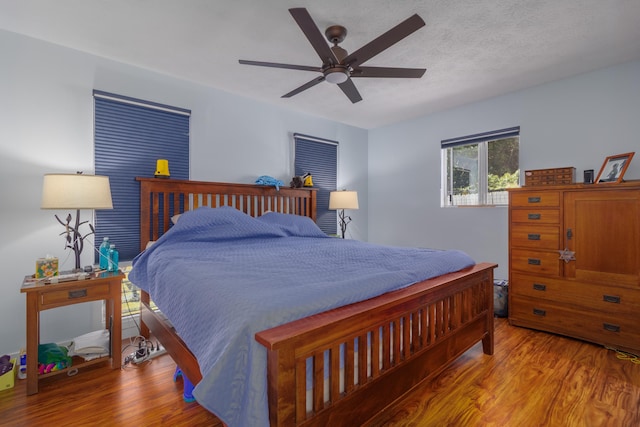 45-550 Miulana Pl, Honokaa, HI 96727 - bedroom with wood finished floors and ceiling fan