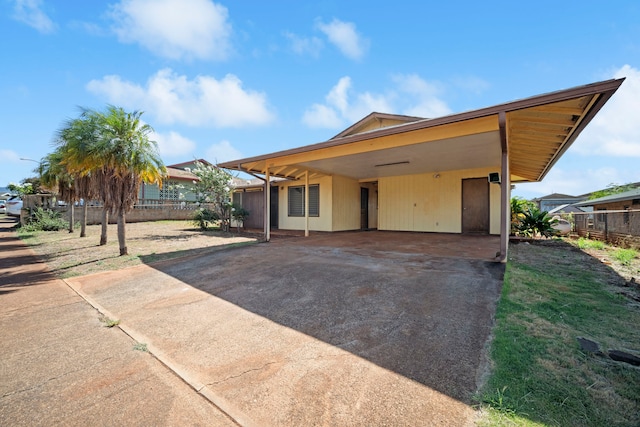 522 Aewa St, Eleele, HI 96705 - view of front of house featuring concrete driveway and a carport