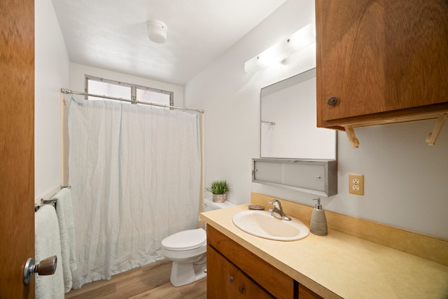 522 Aewa St, Eleele, HI 96705 - full bathroom with vanity, wood finished floors, and shower / tub combo with curtain