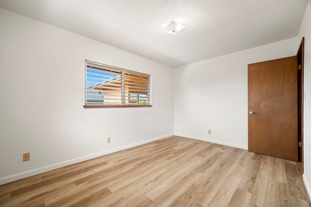 522 Aewa St, Eleele, HI 96705 - empty room with wood finished floors and baseboards