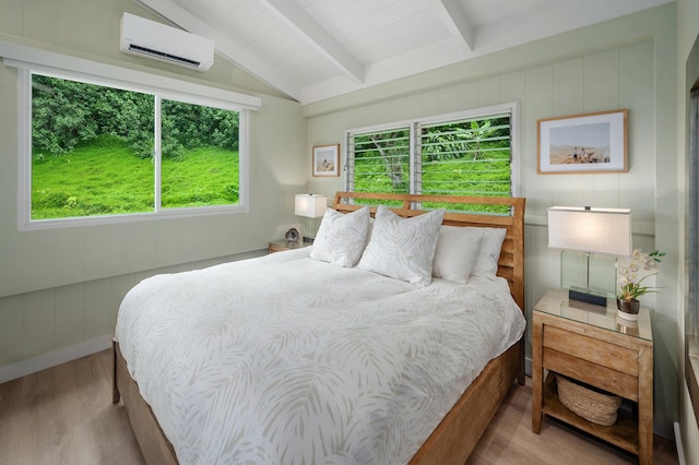4059 Anini Rd, Kilauea, HI 96754 - bedroom featuring a wall mounted air conditioner, wood finished floors, and multiple windows