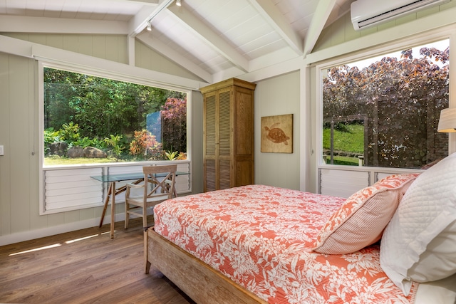 4059 Anini Rd, Kilauea, HI 96754 - bedroom featuring an AC wall unit, wood finished floors, and track lighting