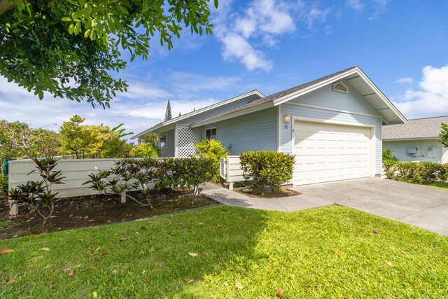 75-252 Nani Kailua Dr Unit 23, Kailua-Kona, HI 96740 - view of property exterior with a garage and concrete driveway