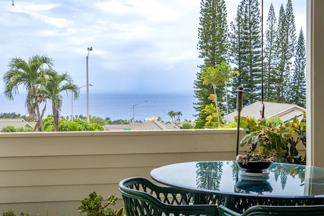 75-252 Nani Kailua Dr Unit 23, Kailua-Kona, HI 96740 - balcony with a water view and outdoor dining space