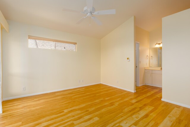 75-252 Nani Kailua Dr Unit 23, Kailua-Kona, HI 96740 - unfurnished room with light wood-style floors, ceiling fan, baseboards, and lofted ceiling