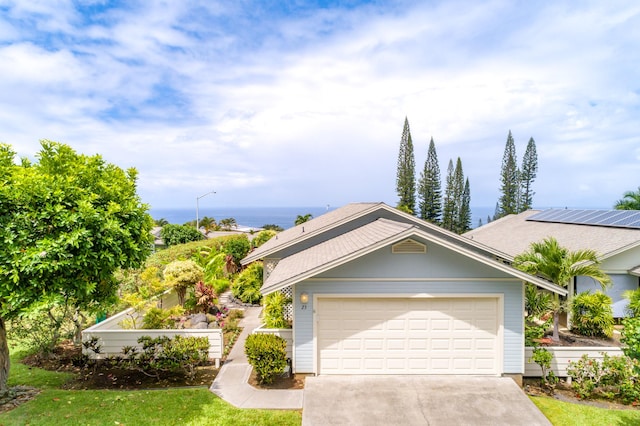 75-252 Nani Kailua Dr Unit 23, Kailua-Kona, HI 96740 - view of front of property with driveway and an attached garage