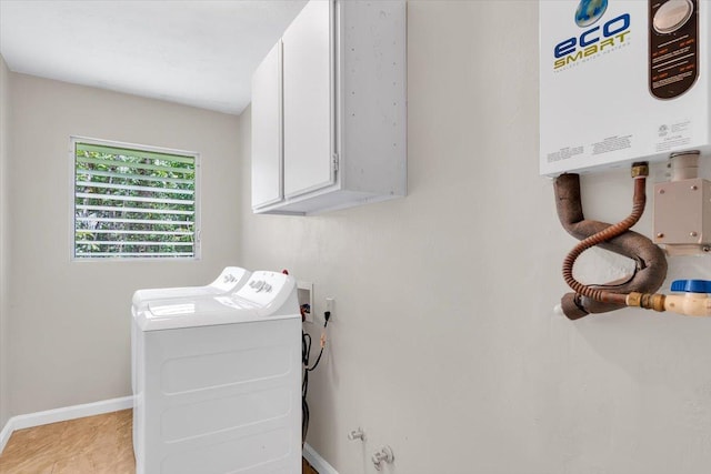 14-882 Kehau Rd, Pahoa, HI 96778 - washroom with cabinet space, baseboards, and washer hookup
