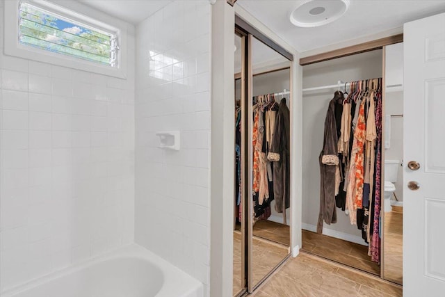 14-882 Kehau Rd, Pahoa, HI 96778 - bathroom featuring a walk in closet, tub / shower combination, and toilet