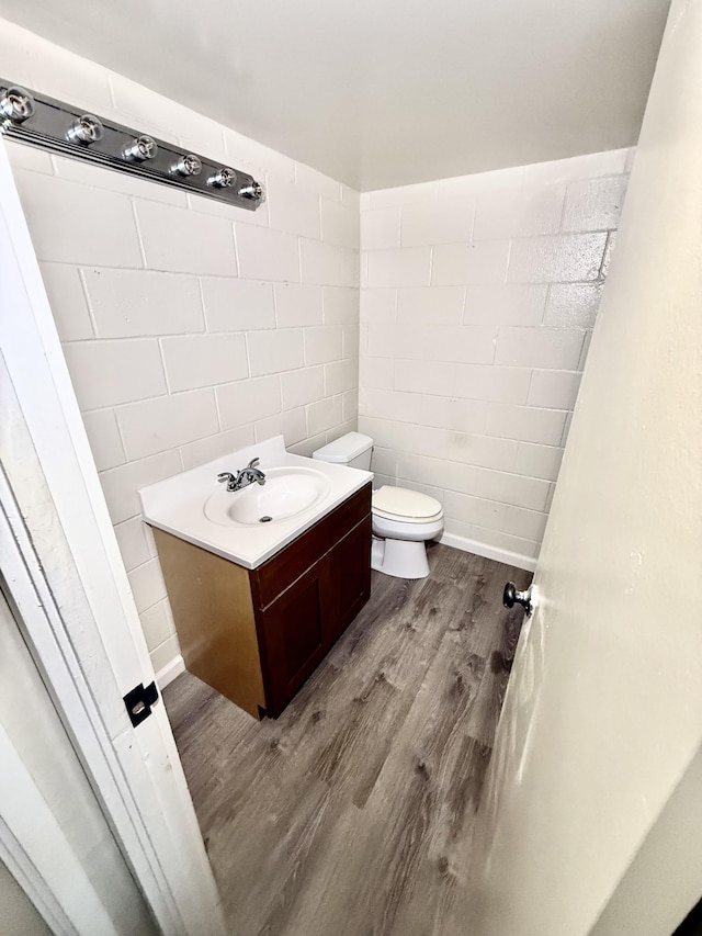 4156 Rice St Unit 306, Lihue, HI 96766 - bathroom with wood finished floors, vanity, and toilet