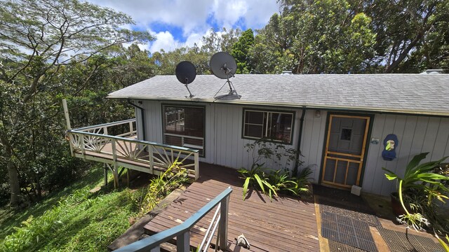 3215-C Wawae Rd, Kalaheo, HI 96741 - view of front of property with a deck and roof with shingles