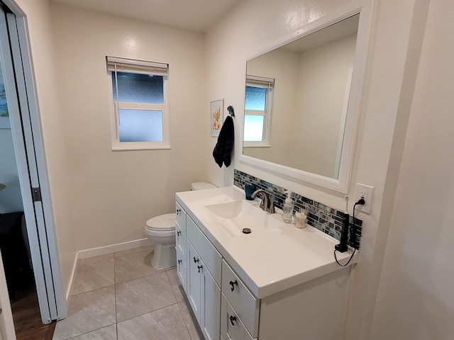 68-1818 Pau Nani St, Waikoloa, HI 96738 - half bathroom with toilet, baseboards, vanity, and tasteful backsplash