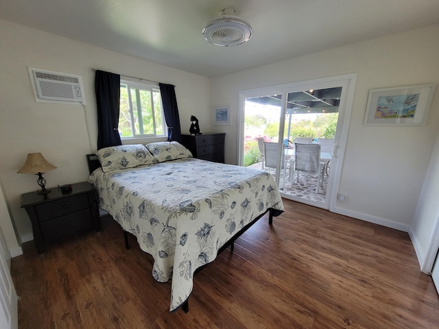 68-1818 Pau Nani St, Waikoloa, HI 96738 - bedroom with access to exterior, dark wood finished floors, an AC wall unit, and baseboards