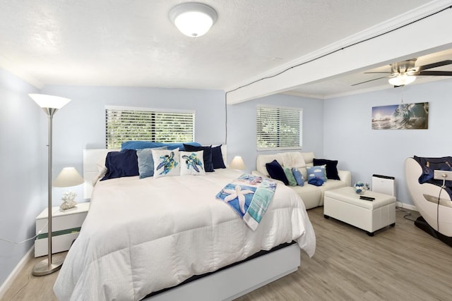 15-1925 4th Ave, Keaau, HI 96749 - bedroom featuring wood finished floors, a ceiling fan, and ornamental molding