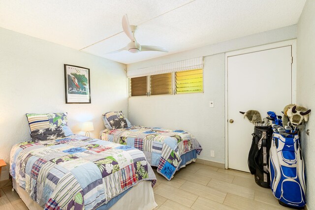 69-1647 Puako Beach Dr Unit 105, Kamuela, HI 96743 - bedroom featuring a ceiling fan