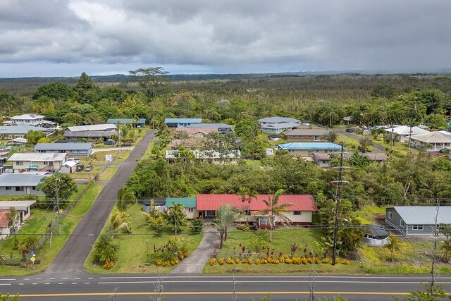 16-2038 Maile Way, Pahoa, HI 96778 - aerial view of residential area with a heavily wooded area