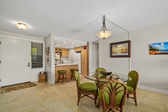 5380 Honoiki Rd Unit F16, Princeville, HI 96722 - dining room featuring baseboards