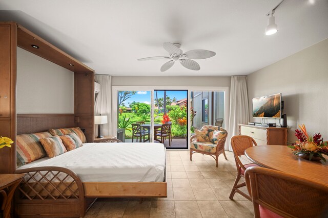 4-1250 Kuhio Hwy Unit H105, Kapaa, HI 96746 - bedroom featuring access to exterior and ceiling fan