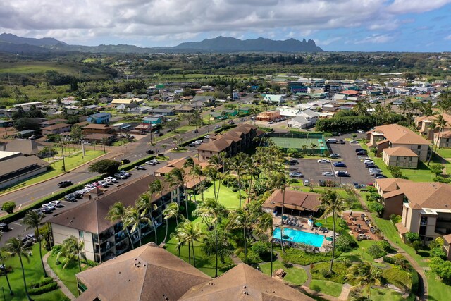 4-1250 Kuhio Hwy Unit H105, Kapaa, HI 96746 - aerial view of property's location featuring a mountainous background and nearby suburban area