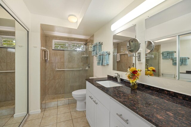 1763 Pee Rd Unit 304, Koloa, HI 96756 - full bath featuring toilet, tile patterned floors, and tiled shower