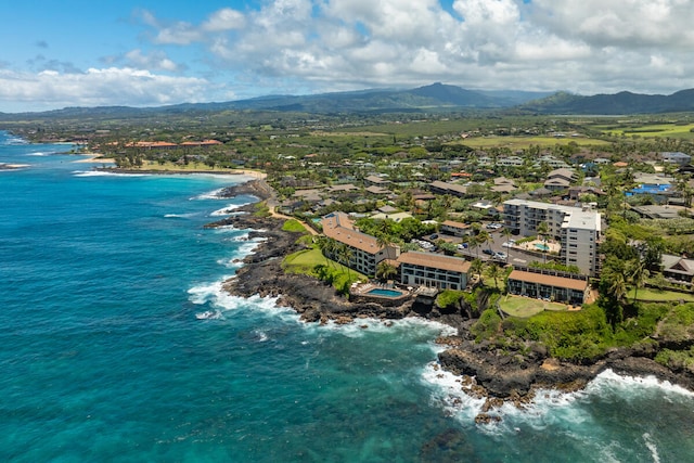 1763 Pee Rd Unit 304, Koloa, HI 96756 - drone / aerial view of a water and mountain view