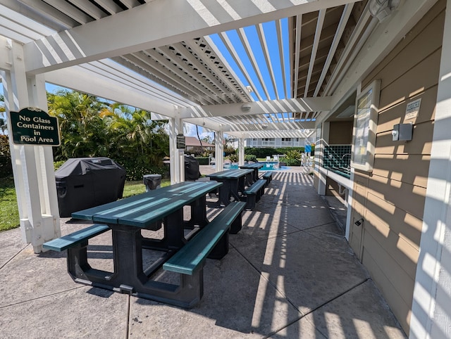 75-6081 Alii Dr Unit Dd102, Kailua-Kona, HI 96740 - view of patio with outdoor dining space and a grill