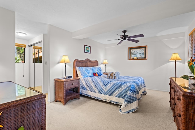 78-6737 Walua Rd, Kailua-Kona, HI 96740 - carpeted bedroom with ceiling fan, a closet, and baseboards