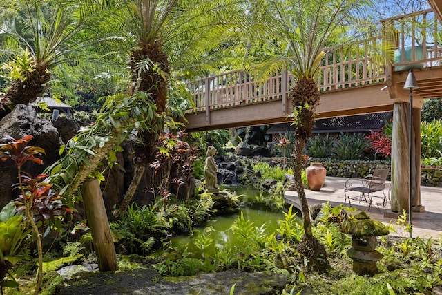 78-6737 Walua Rd, Kailua-Kona, HI 96740 - view of yard featuring a small pond and a deck