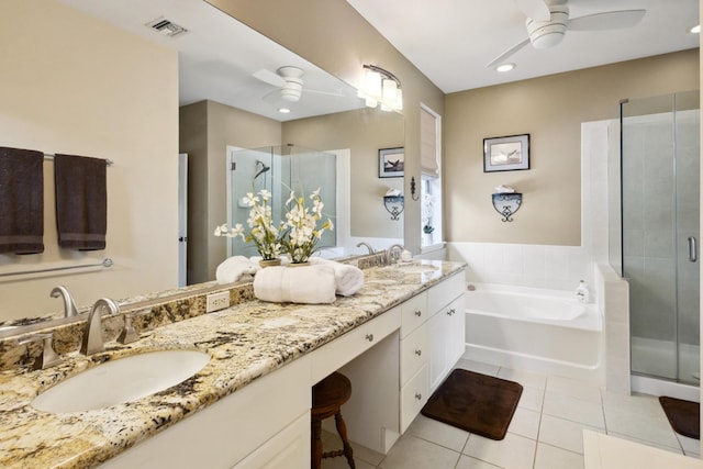 75-149 Kamilo St, Kailua-Kona, HI 96740 - full bathroom featuring a ceiling fan, a garden tub, tile patterned floors, a shower stall, and double vanity