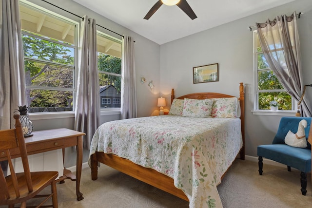 75-149 Kamilo St, Kailua-Kona, HI 96740 - carpeted bedroom featuring multiple windows, baseboards, and ceiling fan