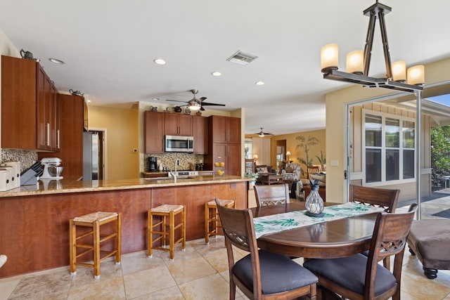 75-149 Kamilo St, Kailua-Kona, HI 96740 - dining room with a ceiling fan, recessed lighting, and light tile patterned floors