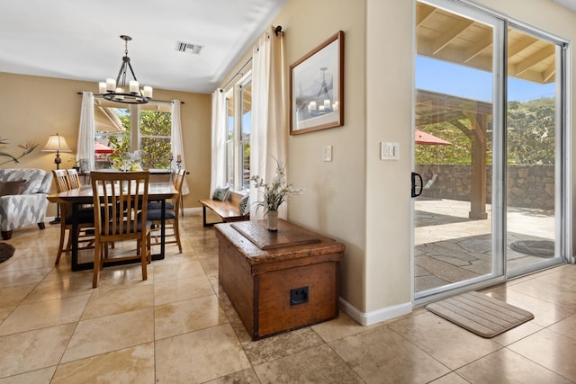 75-149 Kamilo St, Kailua-Kona, HI 96740 - dining room featuring a chandelier, baseboards, and light tile patterned floors