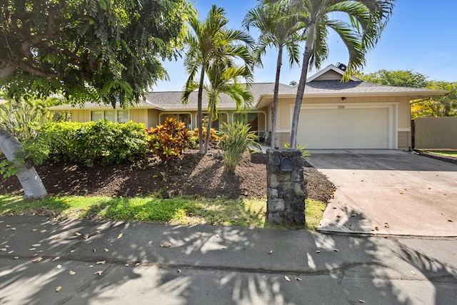 75-149 Kamilo St, Kailua-Kona, HI 96740 - ranch-style house featuring a garage and concrete driveway