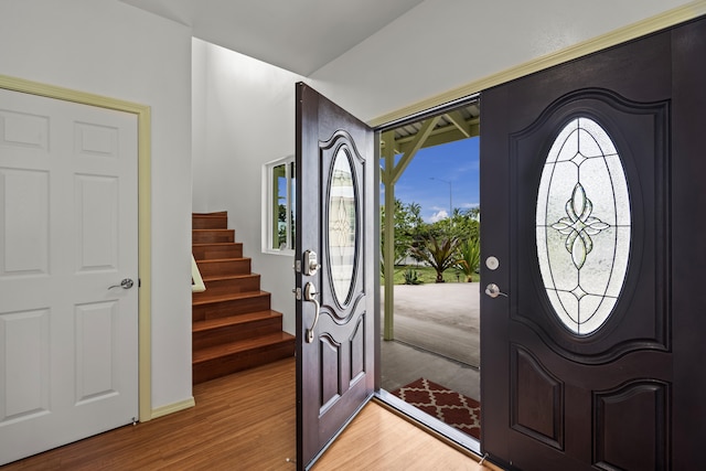76-6347 Kupuna St, Kailua-Kona, HI 96740 - foyer entrance featuring light wood finished floors and stairway