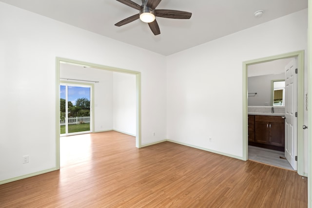 76-6347 Kupuna St, Kailua-Kona, HI 96740 - spare room featuring light wood finished floors, a smoke detector, ceiling fan, and baseboards