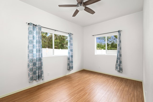 76-6347 Kupuna St, Kailua-Kona, HI 96740 - empty room featuring wood finished floors, ceiling fan, and baseboards