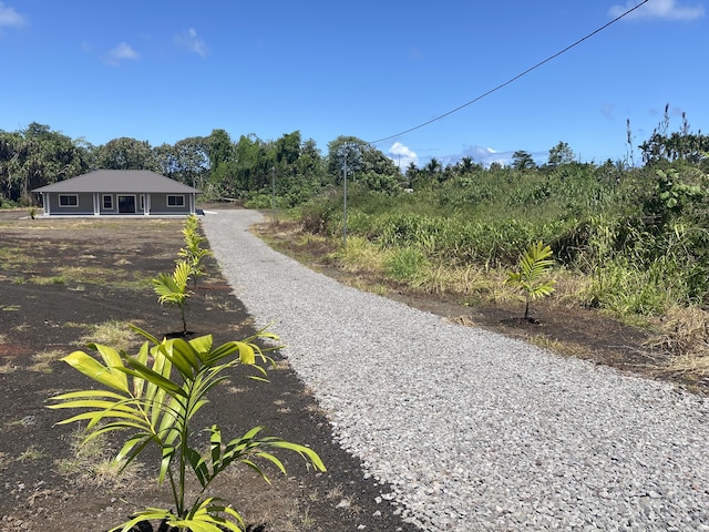 16-1657 34th Ave, Keaau, HI 96760 - view of property's community featuring gravel driveway