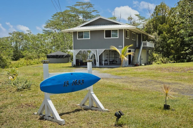 15-1653 28th Ave, Keaau, HI 96749 - back of property with a lawn and stairway