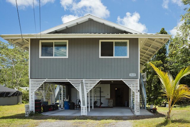 15-1653 28th Ave, Keaau, HI 96749 - view of front of house with stairs and a carport