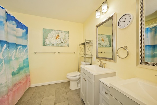 15-1653 28th Ave, Keaau, HI 96749 - bathroom featuring two vanities, toilet, and tile patterned floors
