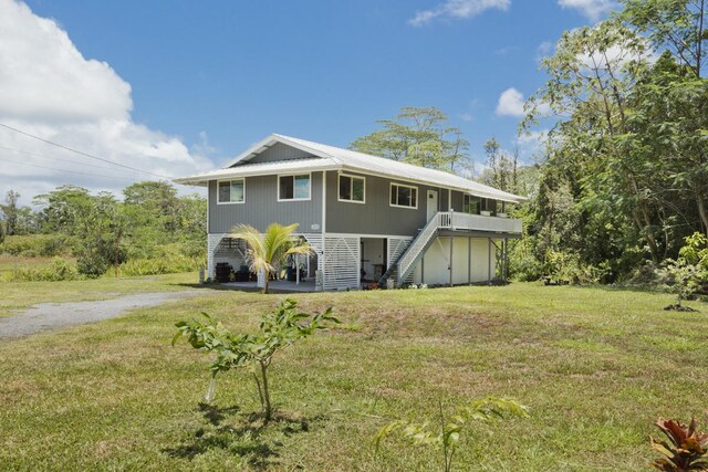 15-1653 28th Ave, Keaau, HI 96749 - beach home with stairs, dirt driveway, and a front lawn