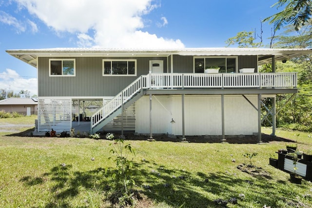 15-1653 28th Ave, Keaau, HI 96749 - view of front of home featuring stairs, a front yard, and metal roof