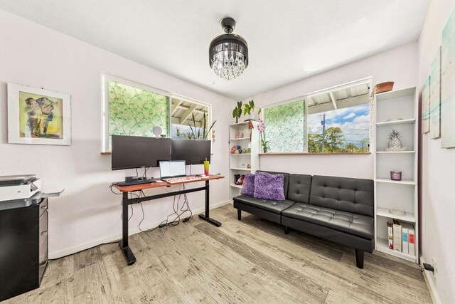 15-1653 28th Ave, Keaau, HI 96749 - office area featuring wood finished floors, a chandelier, and baseboards