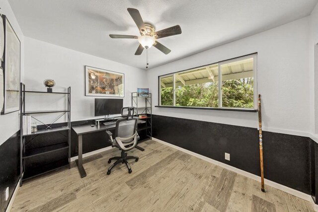 15-1653 28th Ave, Keaau, HI 96749 - office space featuring wood finished floors, ceiling fan, and baseboards