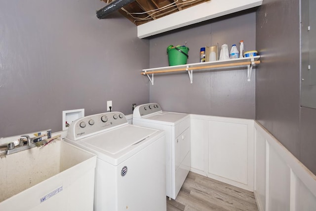 15-1653 28th Ave, Keaau, HI 96749 - laundry room with washer and clothes dryer and light wood finished floors