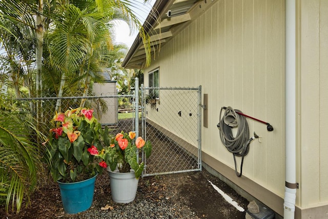 16-2081 Ohia Dr, Pahoa, HI 96778 - view of side of property featuring a gate